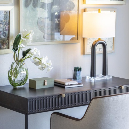 a table with a vase of flowers